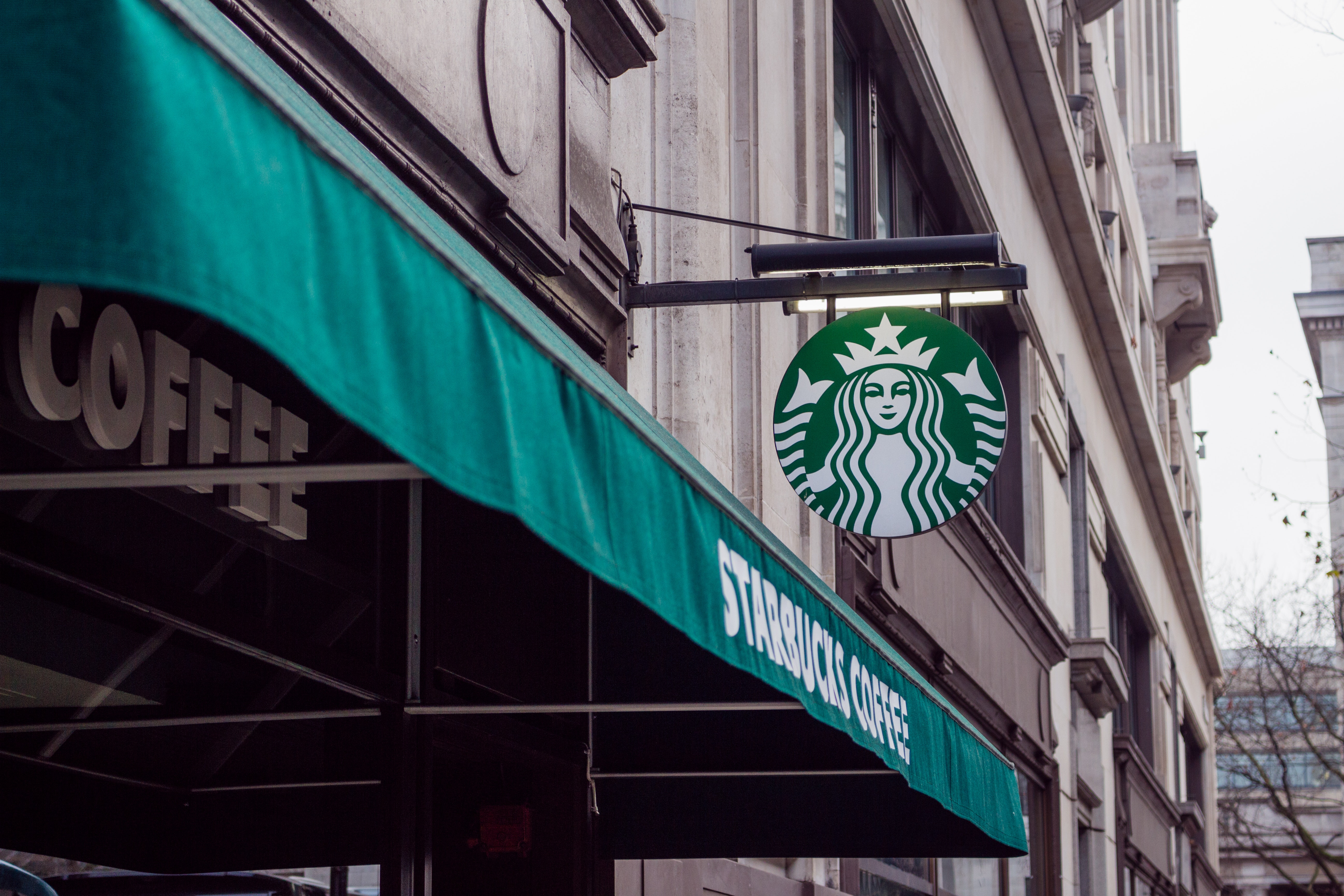 Starbucks Cuts Corporate Workers To Revive Investor Interest
